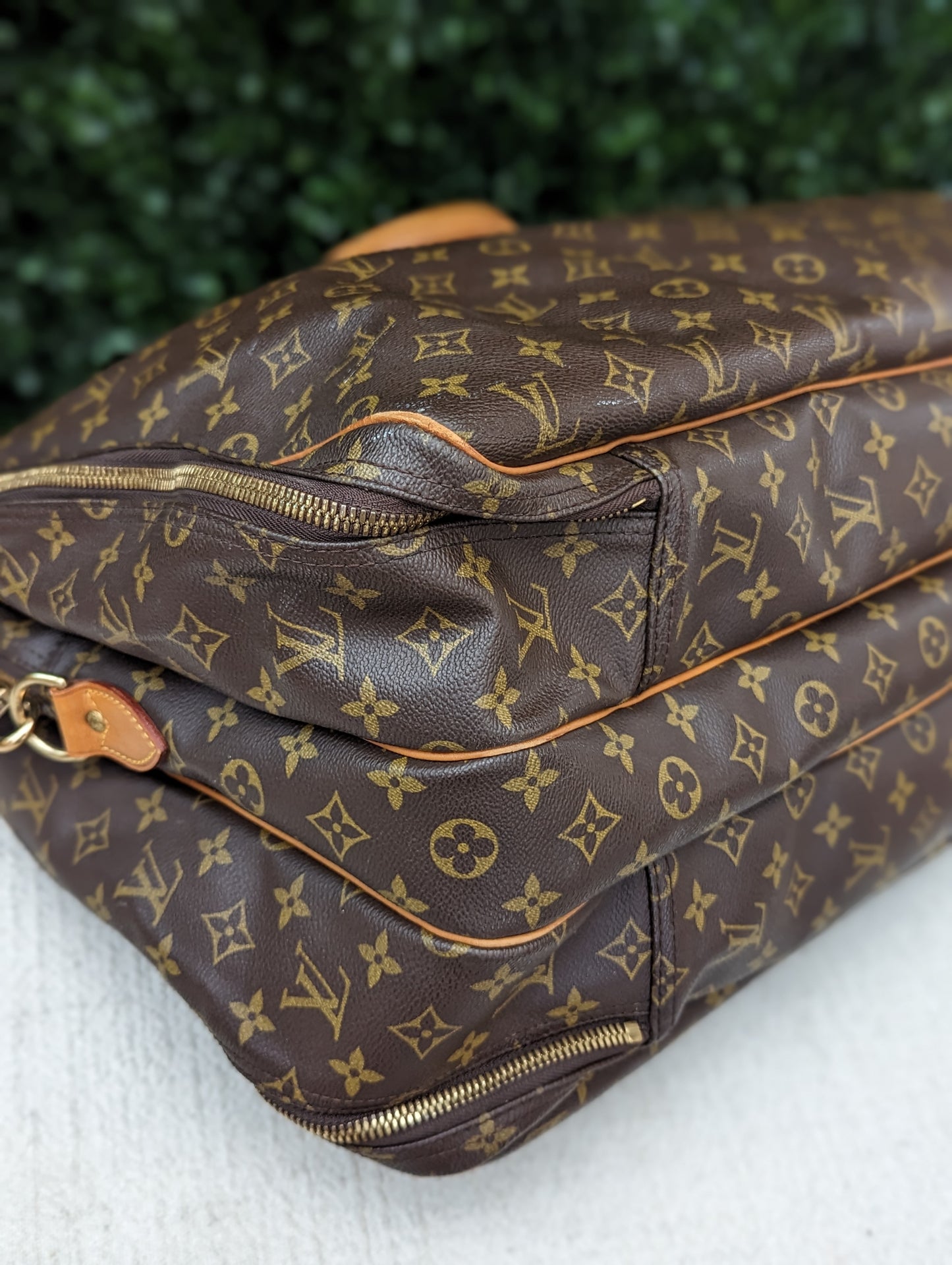 Louis Vuitton Monogram Alize 3 Poche Travel Bag